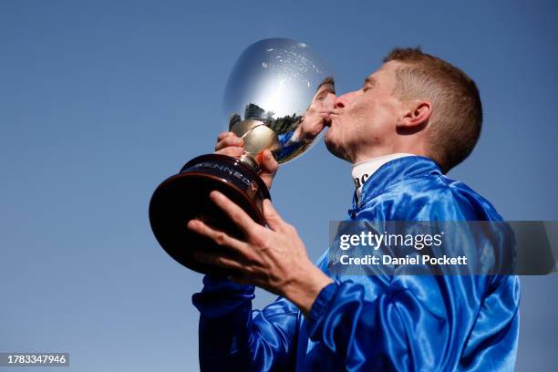 James McDonald riding Zardozi celebrates with the Kennedy Oaks Cup Trophy after winning Race 8 Kennedy Oaks during Oaks Day at Flemington Racecourse...