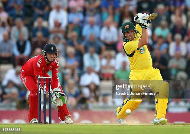 Aaron Finch of Australia bats as Jos Buttler of England keeps wicket during the 1st NatWest Series T20 match between England and Australia at Ageas...