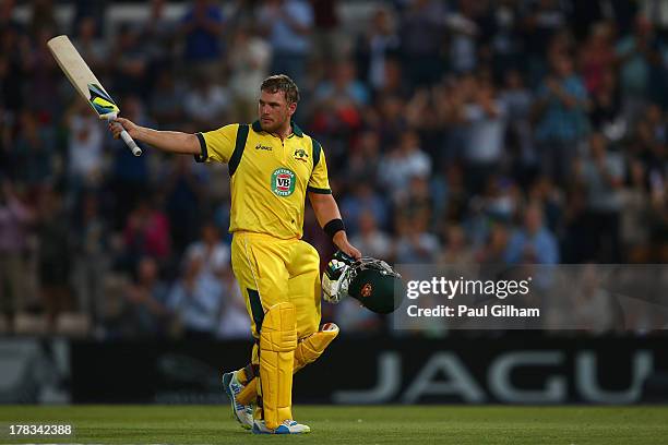 Aaron Finch of Australia acknowledges the crowd as he walks off after hitting a record 156 runs during the 1st NatWest Series T20 match between...