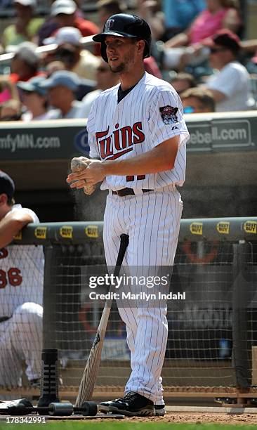 Clete Thomas of the Minnesota Twins in the warm up circle during the fifth inning against the Kansas City Royals at Target Field on August 29, 2013...