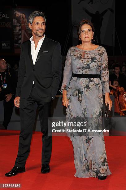 Actor Carmine Maringola and director Emma Dante attend "Via Castellana Bandiera" Premiere during the 70th Venice International Film Festival at...