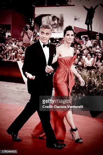 Actors Sandra Bullock and George Clooney attend 'Gravity' premiere and Opening Ceremony during The 70th Venice International Film Festival at Sala...