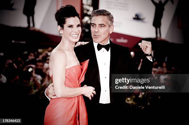 Actors Sandra Bullock and George Clooney attend 'Gravity' premiere and Opening Ceremony during The 70th Venice International Film Festival at Sala...