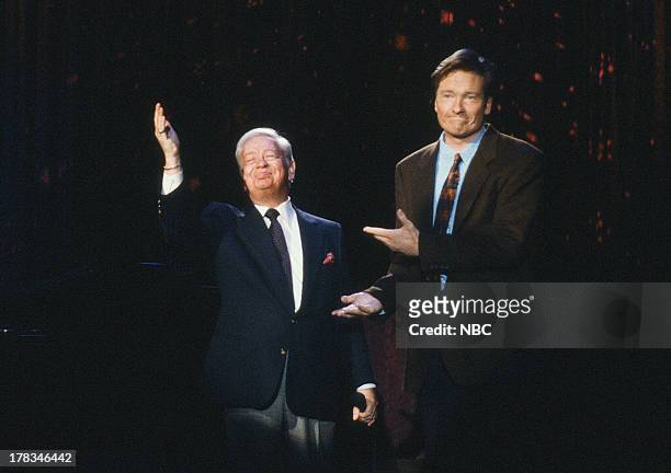 Episode 15 -- Pictured: Musical guest Mel Torme with host Conan O'Brien on October 1, 1993 --