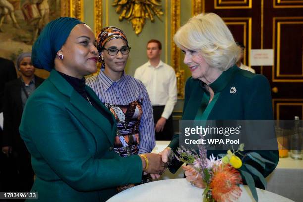 Queen Camilla meets First Lady of Zanzibar Maryam Mwinyi as she attends the Commonwealth Women Leader's event at Marlborough House on November 15,...