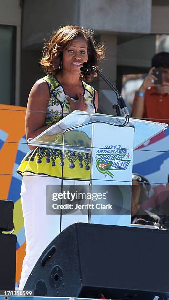 First Lady of the United States Michelle Obama speaks at the 2013 Arthur Ashe Kids Day at USTA Billie Jean King National Tennis Center on August 24,...