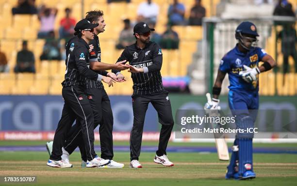 Tim Southee of New Zealand celebrates the wicket of Pathum Nissanka of Sri Lanka during the ICC Men's Cricket World Cup India 2023 between New...