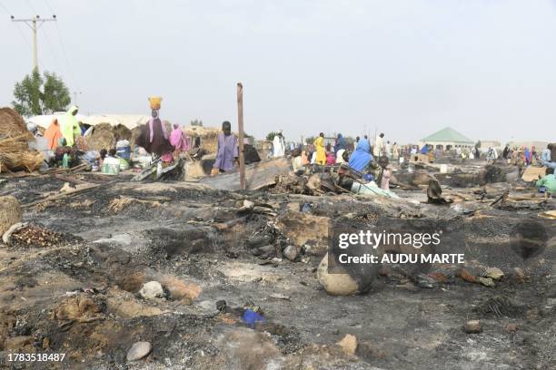 General view of destruction caused after a fire broke out at Muna Alamdiri camp near Maiduguri on November 15, 2023. At least two children died when...