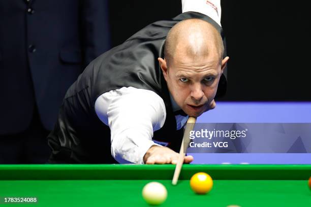 Barry Hawkins of England plays a shot in the quarter-final match against Tom Ford of England on Day 5 of the 2023 International Championship at the...