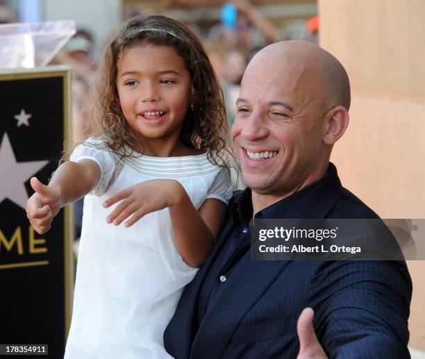 Actor Vin Diesel and daughter Hania Riley participate in the Star Ceremony for Vin Diesel on the Hollywood Walk Of Fame held on August 26, 2013 in...
