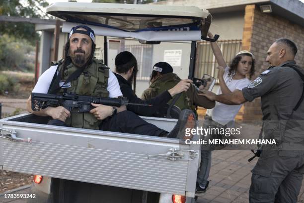 Jewish ultra-Orthodox civilian members of the first-response tactical team, armed with automatic weapons, take part in a defence training during a...
