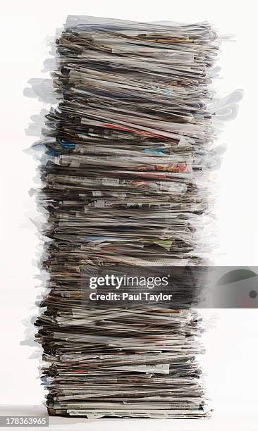 stack of newspapers - newspaper stack stock pictures, royalty-free photos & images