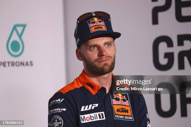 Brad Binder of South Africa and Red Bull KTM Factory Racing looks on during the press conference pre-event during the MotoGP of Malaysia - Previews...
