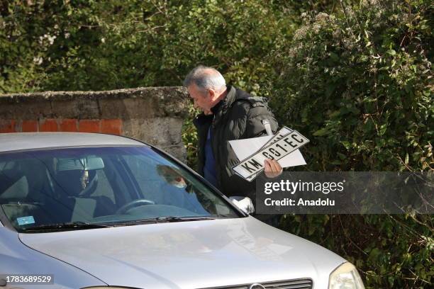 People replace their vehicle license plates issued by Serbian institutions and symbolizing Kosovo cities with Republic of Kosovo license plates after...