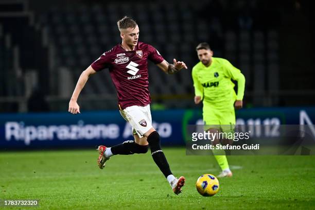 Ivan Ilic of Torino FC in action during the Serie A TIM match between Torino FC and US Sassuolo at Stadio Olimpico di Torino on November 6, 2023 in...