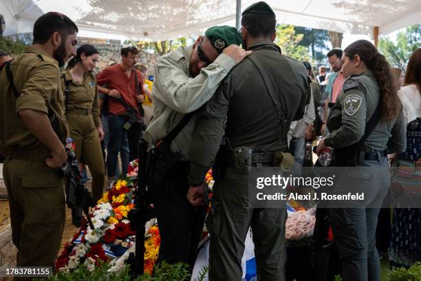 Fellow border police officers, friends, and soldiers grieve for US-born Border Police Officer Rose Ida Lubin, 20-years-old during her funeral at...