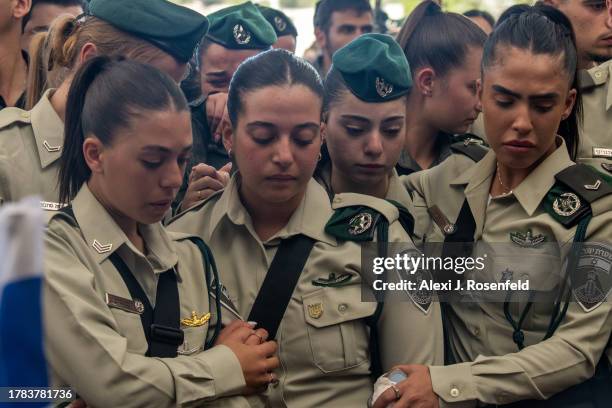 Fellow border police officers, friends, and soldiers grieve for US-born Border Police Officer Rose Ida Lubin, 20-years-old during her funeral at...