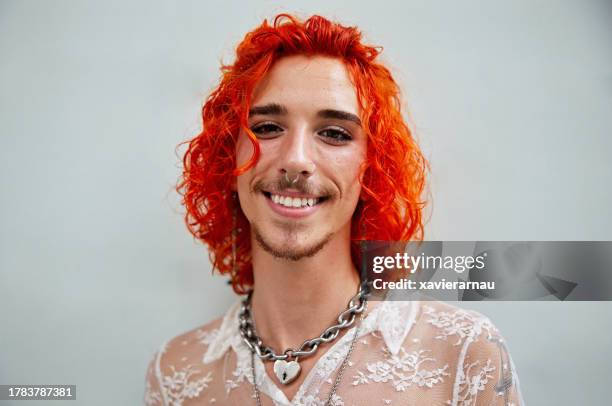 headshot of young gay man with dyed red hair - pierced nose stock pictures, royalty-free photos & images