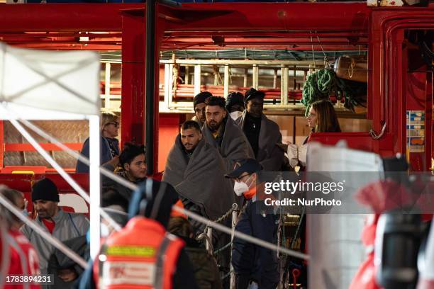 Part of the 128 migrants who are disembarking from the Ocean Viking in the Port Of Ortona and rescued by the Croce Rossa Italiana in the night...