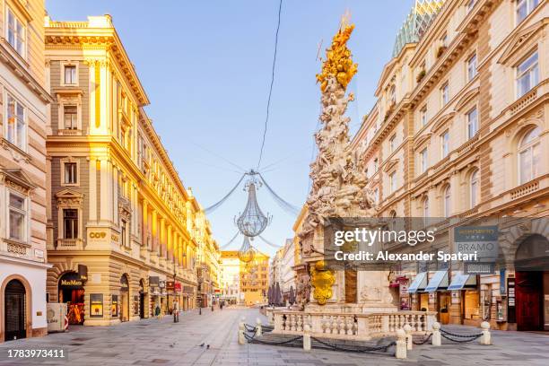 graben square and plague column monument in vienna, austria - pestsäule vienna stock pictures, royalty-free photos & images