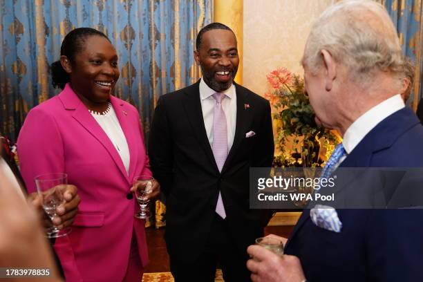 King Charles III meets with Governor of Bermuda Rena Lalgie and Premier and Minister of Finance of Bermuda David Burt during a reception for...