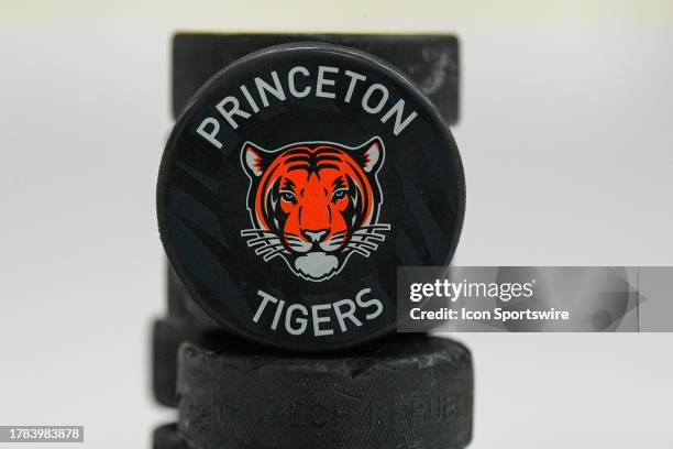 Detail view of a puck with the Princeton Tigers logo before a college hockey game between the Princeton Tigers and the Harvard Crimson on November 3,...