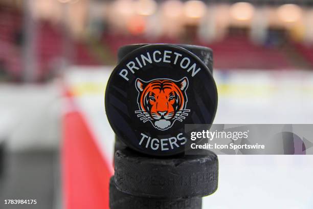 Detail view of a puck with the Princeton Tigers logo before a college hockey game between the Princeton Tigers and the Harvard Crimson on November 3,...