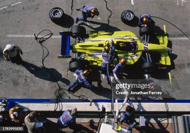 Oriol Servia from Spain drives the Telefonica PPI Motorsports Reynard 2Ki Toyota RV8E V8t makes a pitstop for refueling and tyres during the...