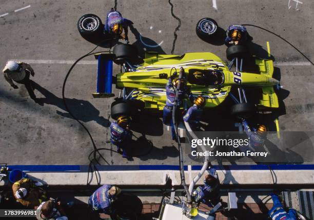 Oriol Servia from Spain drives the Telefonica PPI Motorsports Reynard 2Ki Toyota RV8E V8t makes a pitstop for refueling and tyres during the...