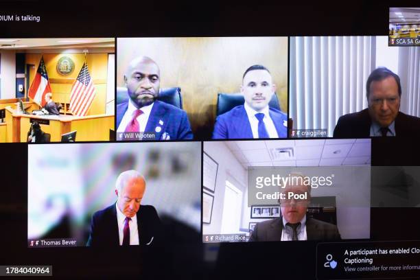 Screen is viewed in the courtroom in a hearing on the Trump indictment at the Fulton County Courthouse, November 15, 2023 in Atlanta, Georgia. Judge...