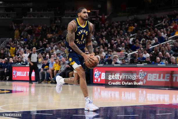 Obi Toppin of the Indiana Pacers dribbles the ball in the first quarter against the Utah Jazz at Gainbridge Fieldhouse on November 08, 2023 in...