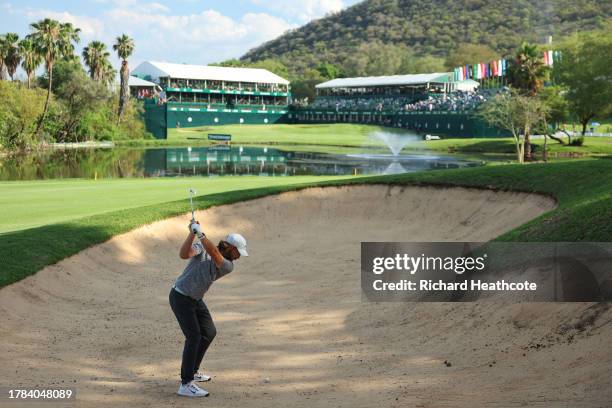 Tommy Fleetwood of England plays from a fairway bunker on the 18th during Day One of the Nedbank Golf Challenge at Gary Player CC on November 09,...