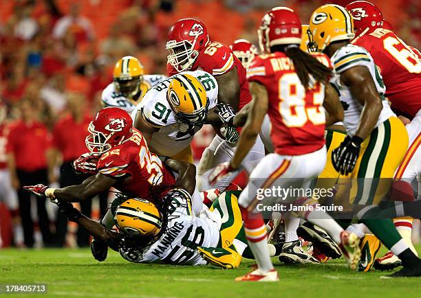 Running back Cyrus Gray of the Kansas City Chiefs carries the ball during the preseason game against the Green Bay Packers at Arrowhead Stadium on...