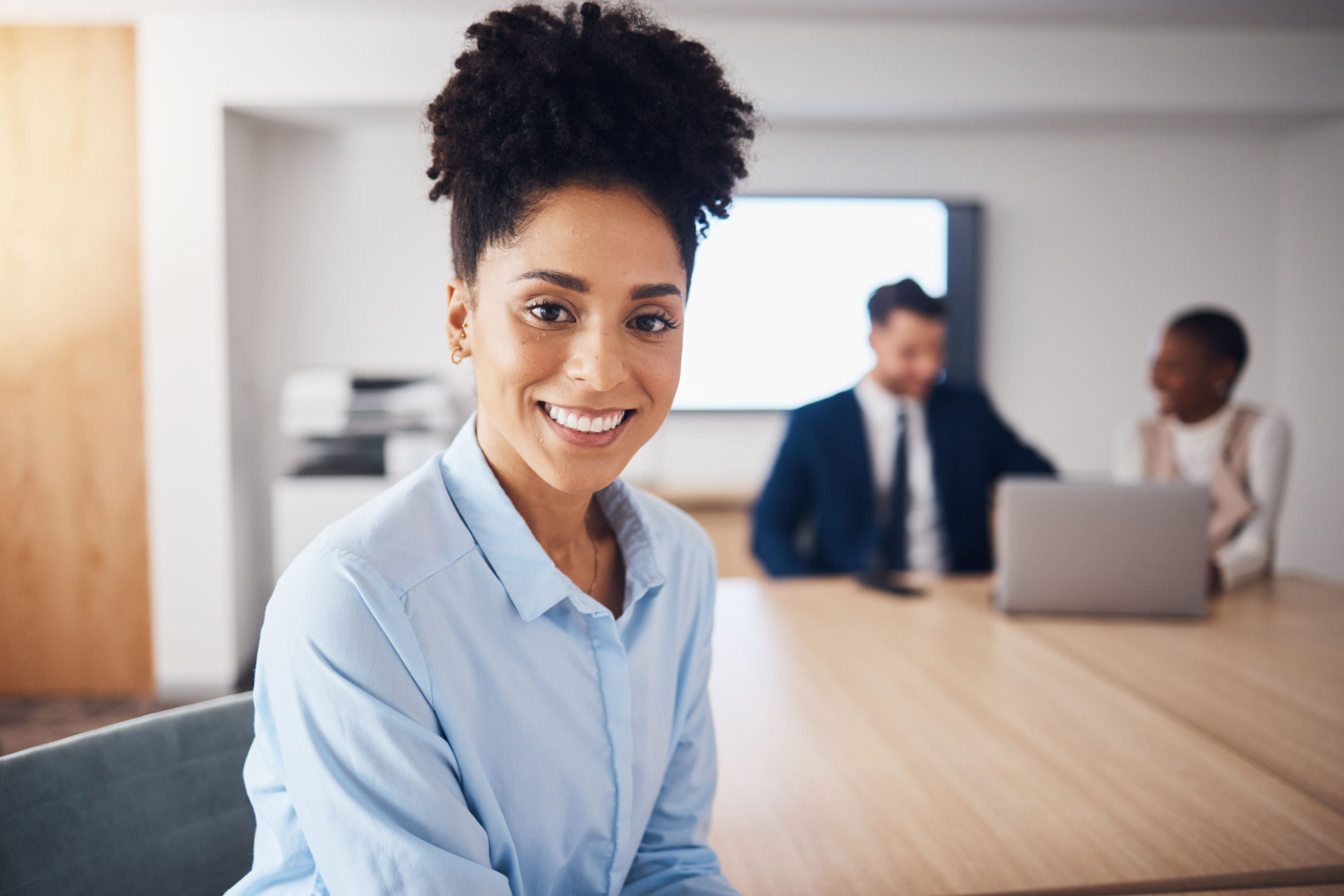 Portrait of happy black woman for professional leadership, mindset and planning in conference room. Young employee, worker or corporate person with employees management, workflow and career mindset Portrait of happy black woman for professional leadership, mindset and planning in conference room. Young employee, worker or corporate person with employees management, workflow and career mindset