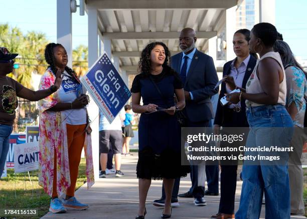 Harris County Judge Lina Hidalgo is greeted by campaign workers and candidates upon arriving to vote on Election Day on Tuesday, Nov. 7, 2023 at West...
