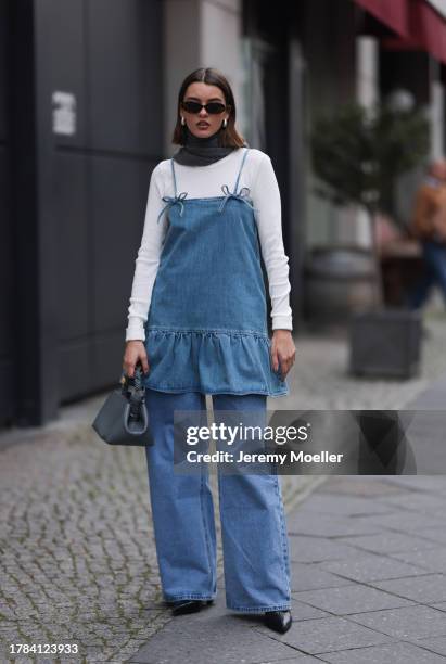 Mary L. Jean seen wearing Crap Eyewear brown tortoise sunglasses, & Other Stories grey wool knit scarf, Zara white long sleeve top, Dish blue denim /...