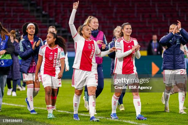 Ashleigh Weerden of AFC Ajax, Chasity Grant of AFC Ajax, Danique Noordman of AFC Ajax thanking the fans for their support and celebrates her sides...