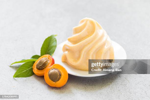 apricot cream pudding,  panna cotta in the form of french chantilly cream, on a plate. close up - chantilly lace - fotografias e filmes do acervo