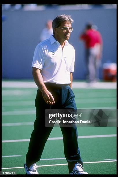 Coach Nick Saban of the Michigan State Spartans stands on the field during a game against the Nebraska Cornhuskers at Spartan Stadium in East...