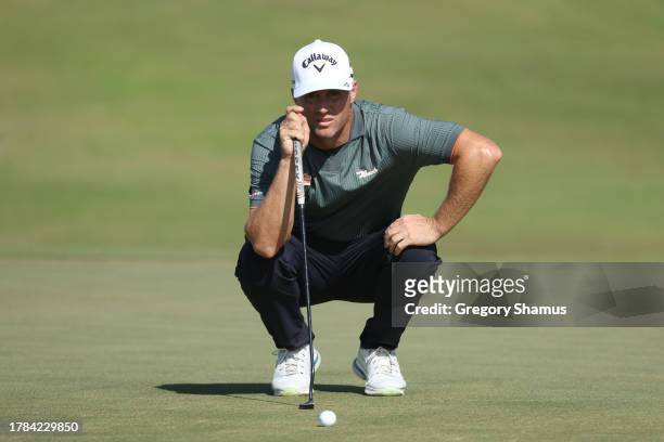 Alex Noren of Sweden lines up a putt on the eighth green during the first round of the Butterfield Bermuda Championship at Port Royal Golf Course on...