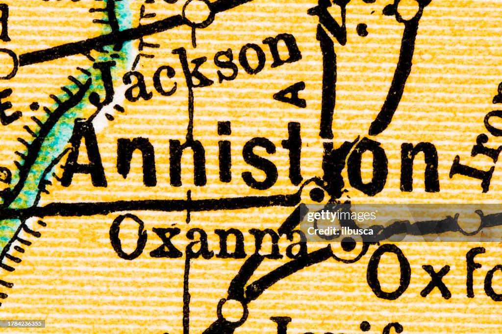 US City names, extreme close up on antique map: Anniston, Alabama