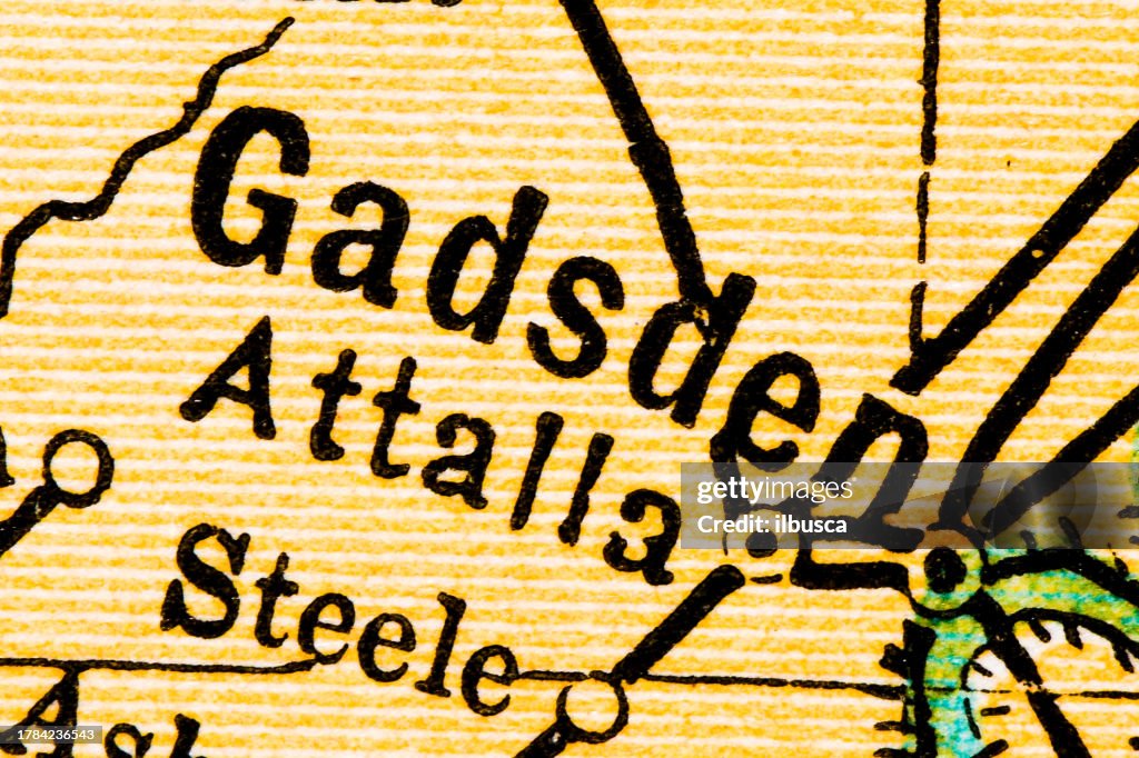 US City names, extreme close up on antique map: Gadsden, Alabama