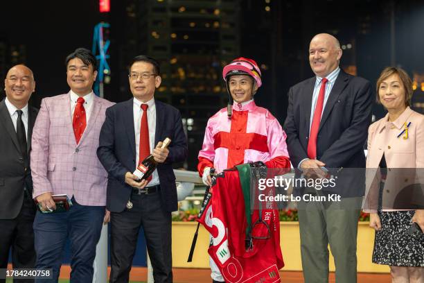 Jockey Derek Leung Ka-chun and trainer David Hayes pose for photo after Lean Hero winning the Race 7 Repulse Bay Handicap at Happy Valley Racecourse...