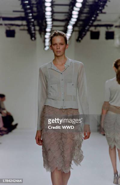 This is the first collection designed by Francisco Costa following Calvin Klein's departure from his eponymous label in the fall of 2003. Model Elise...