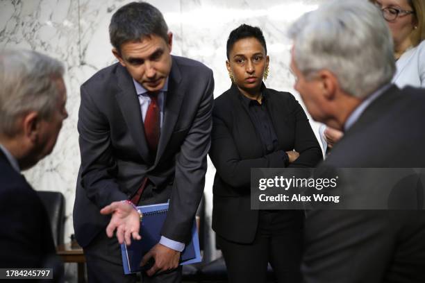 Chief Counsel for Oversight at U.S. Senate Committee on the Judiciary Arya Hariharan listens to Committee Chairman U.S. Sen. Richard Durbin and Sen....