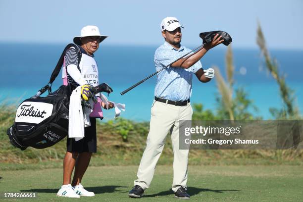 Fabian Gomez of Argentina selects a club on the ninth tee during the first round of the Butterfield Bermuda Championship at Port Royal Golf Course on...