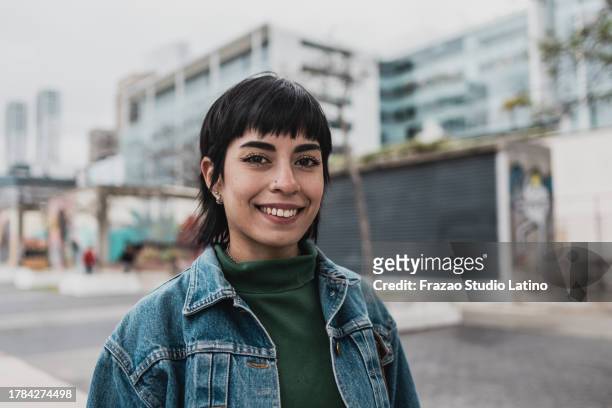 portrait of a young woman in puerto madero, buenos aires - puerto stock pictures, royalty-free photos & images