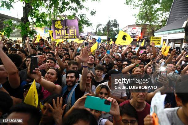 Supporters of Argentine congressman and presidential candidate for La Libertad Avanza Alliance, Javier Milei, attend a campaign rally in Ezeiza,...