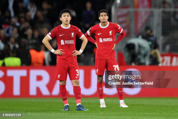 Wataru Endo and Jarell Quansah of Liverpool look dejected after conceding the team's first goal during the UEFA Europa League 2023/24 match between...