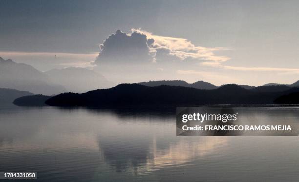 View of the plume of Chilean volcano Puyehue reflected on Nahuel Huapi lake in Bariloche, Rio Negro, some 1600 km southwest of Buenos Aires, on June...